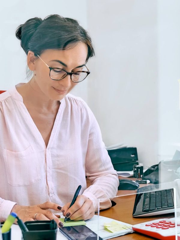 attentive-female-bookkeeper-check-accounts-bills-.jpg